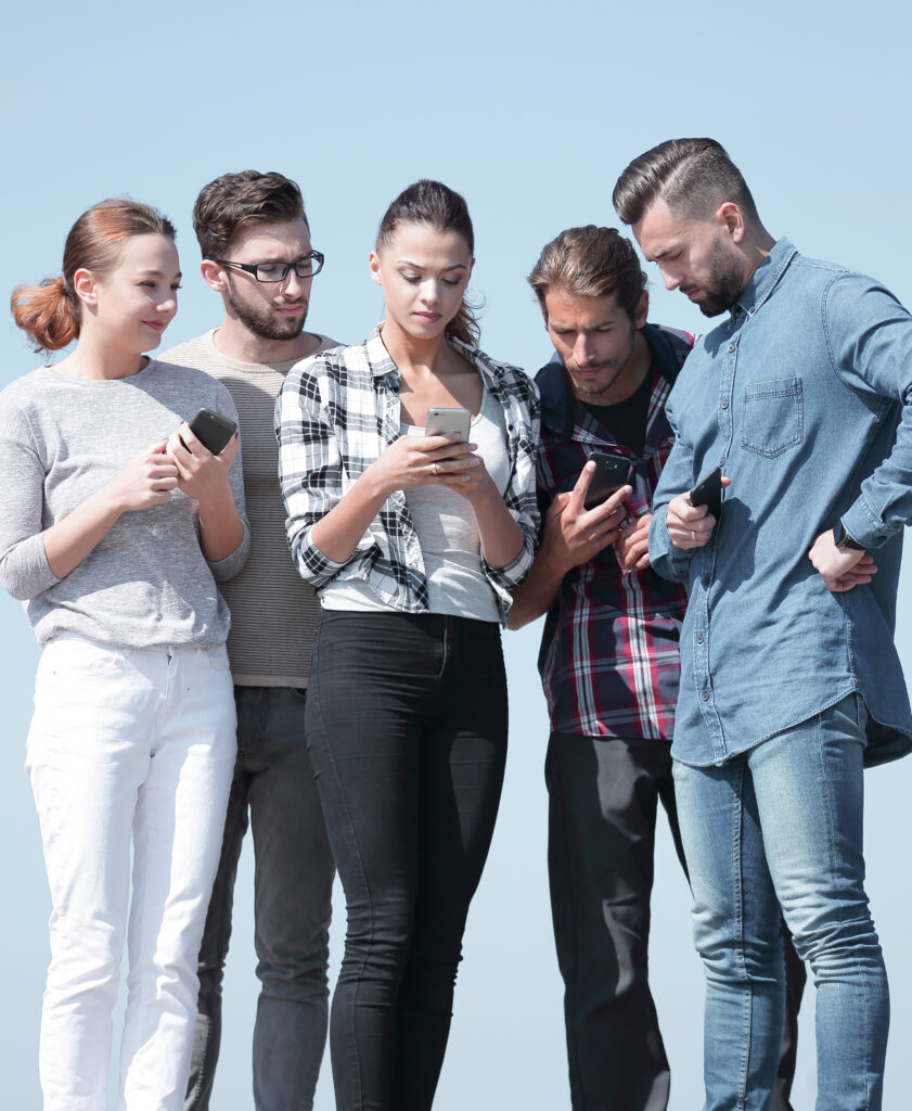 closeup-happy-friends-using-smartphone